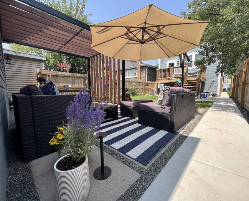 Backyard patio with furniture and planters chicago il