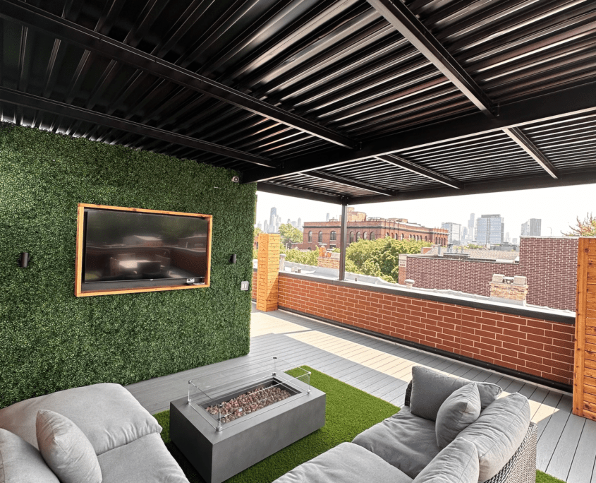 Roof deck lounge with TV and fire pit chicago il